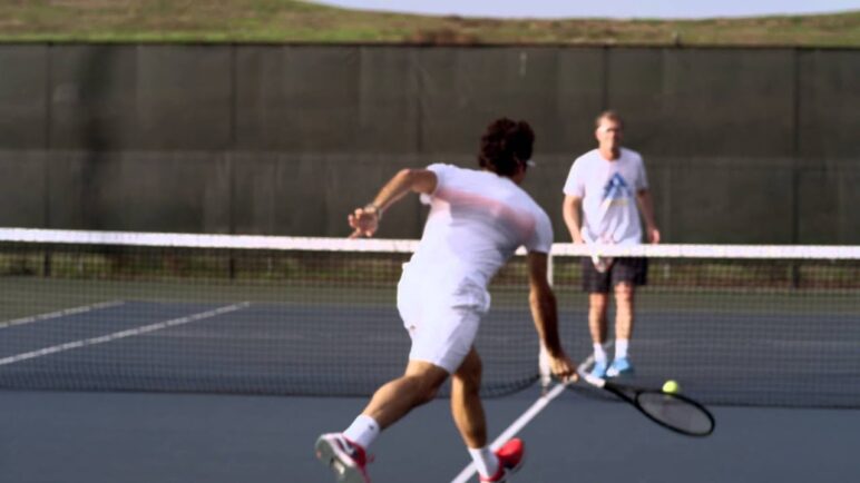 Roger Federer through Glass